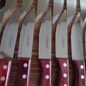 24 Tramontina steak knives.  Never used. 3 sets of 8.  Sold by set.